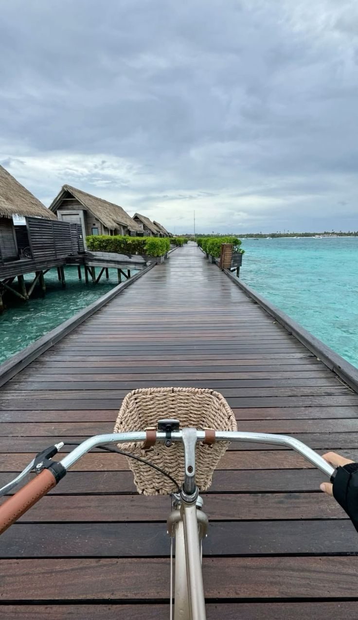 Cycling the jetty at an overwater resort