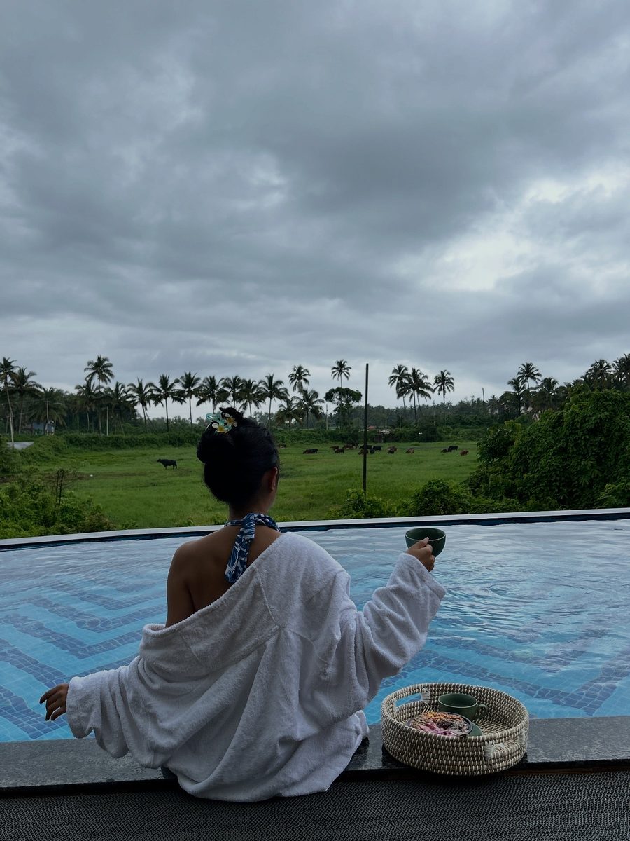 Robe morning at an infinity pool